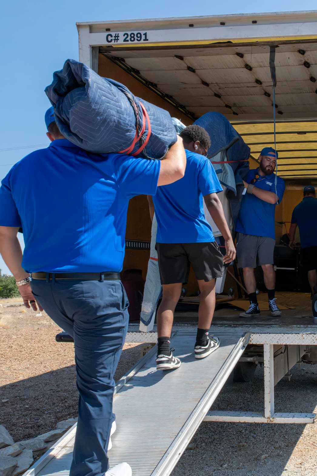 Team Loading Items in the Truck